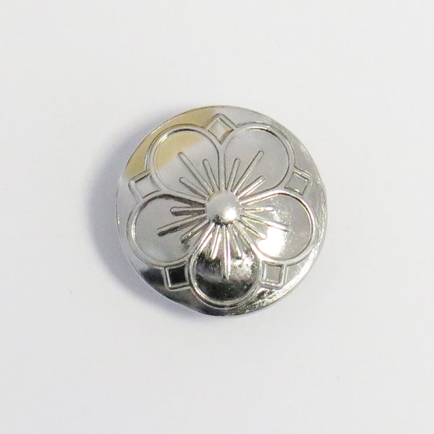 Metal knap med blomst